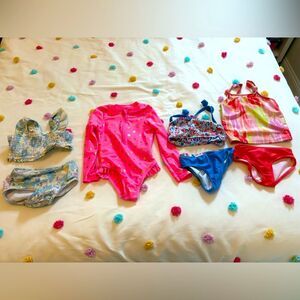 Lot of 4 kids size 4 swimsuits